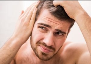 ايقاف تساقط الشعر للرجال